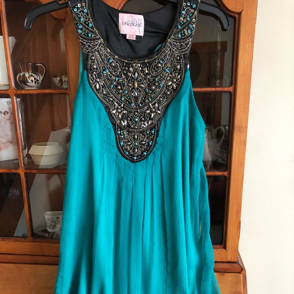 Beautiful, embroidered turquoise dress.